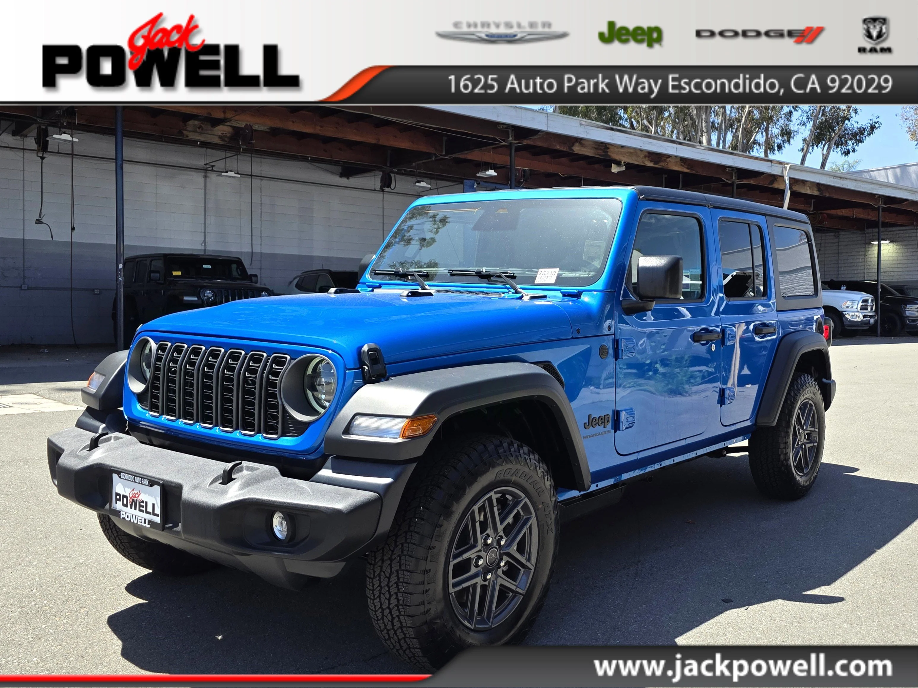 New 2026 Blue Pearl Jeep Sport S image 1
