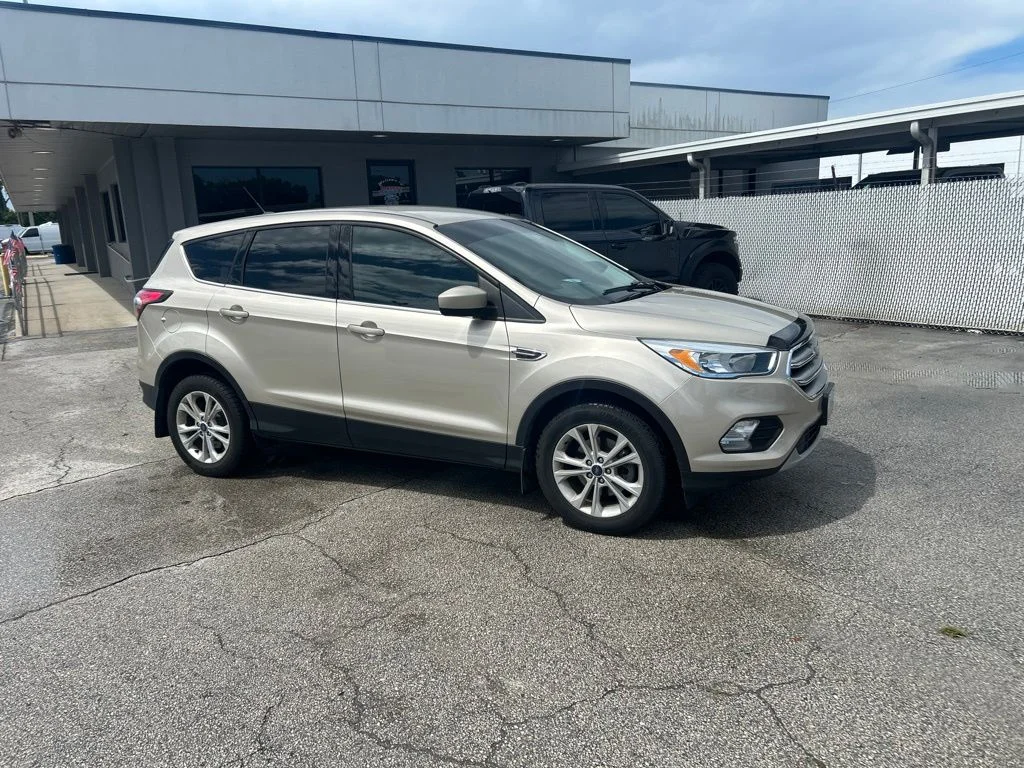 Used 2017 Gold Ford SE image 2