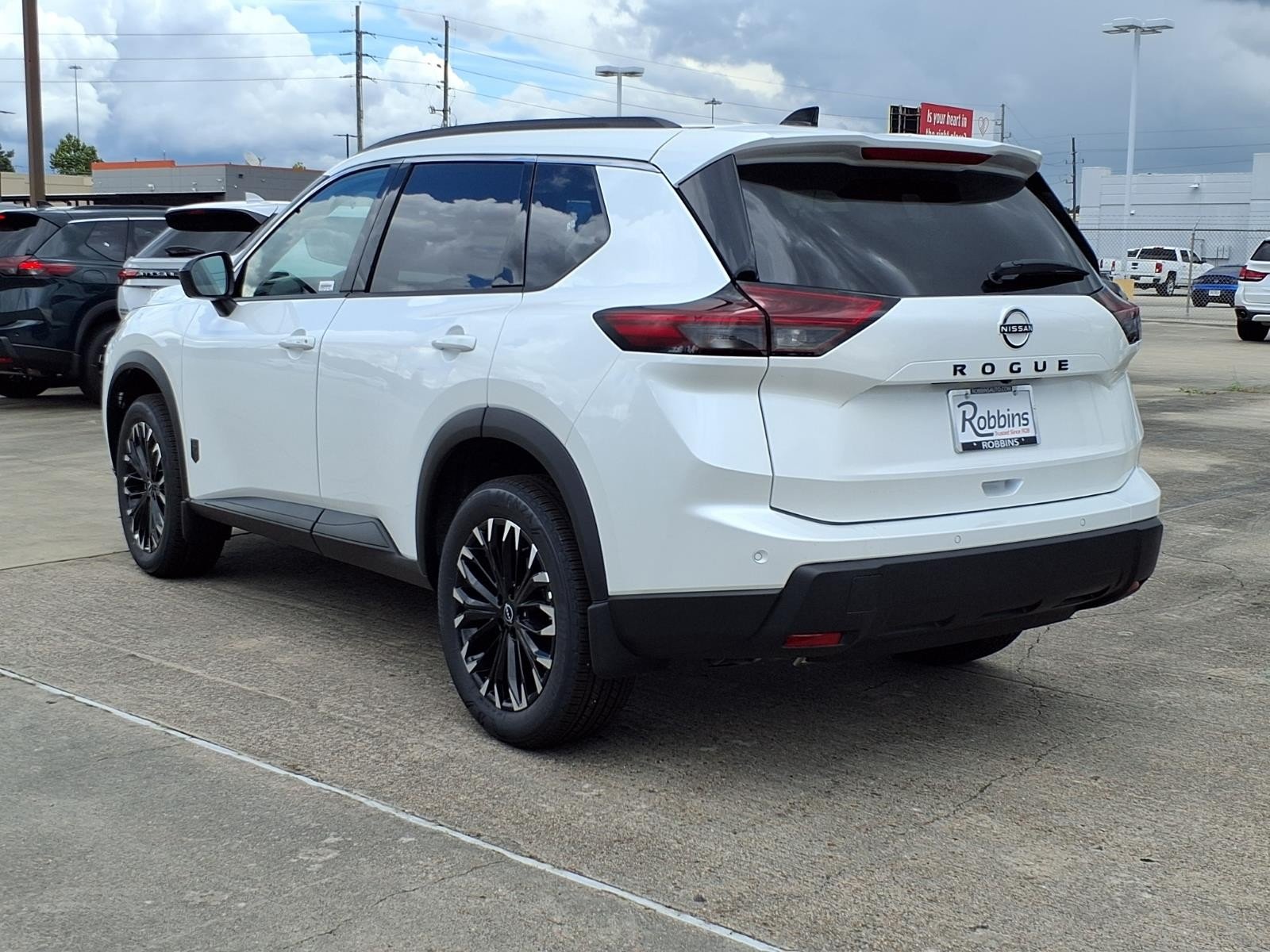 2026 Nissan Rogue Dark Armor™ White at Robbins Nissan