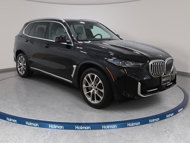 Certified Used 2026 Black Sapphire Metallic BMW xDrive40i image 3