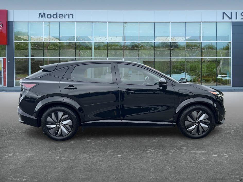 Used 2024 Black Diamond Pearl Nissan EVOLVE+ image 5