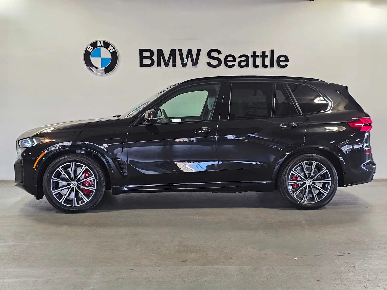 New 2026 Black Sapphire Metallic BMW xDrive50e image 3