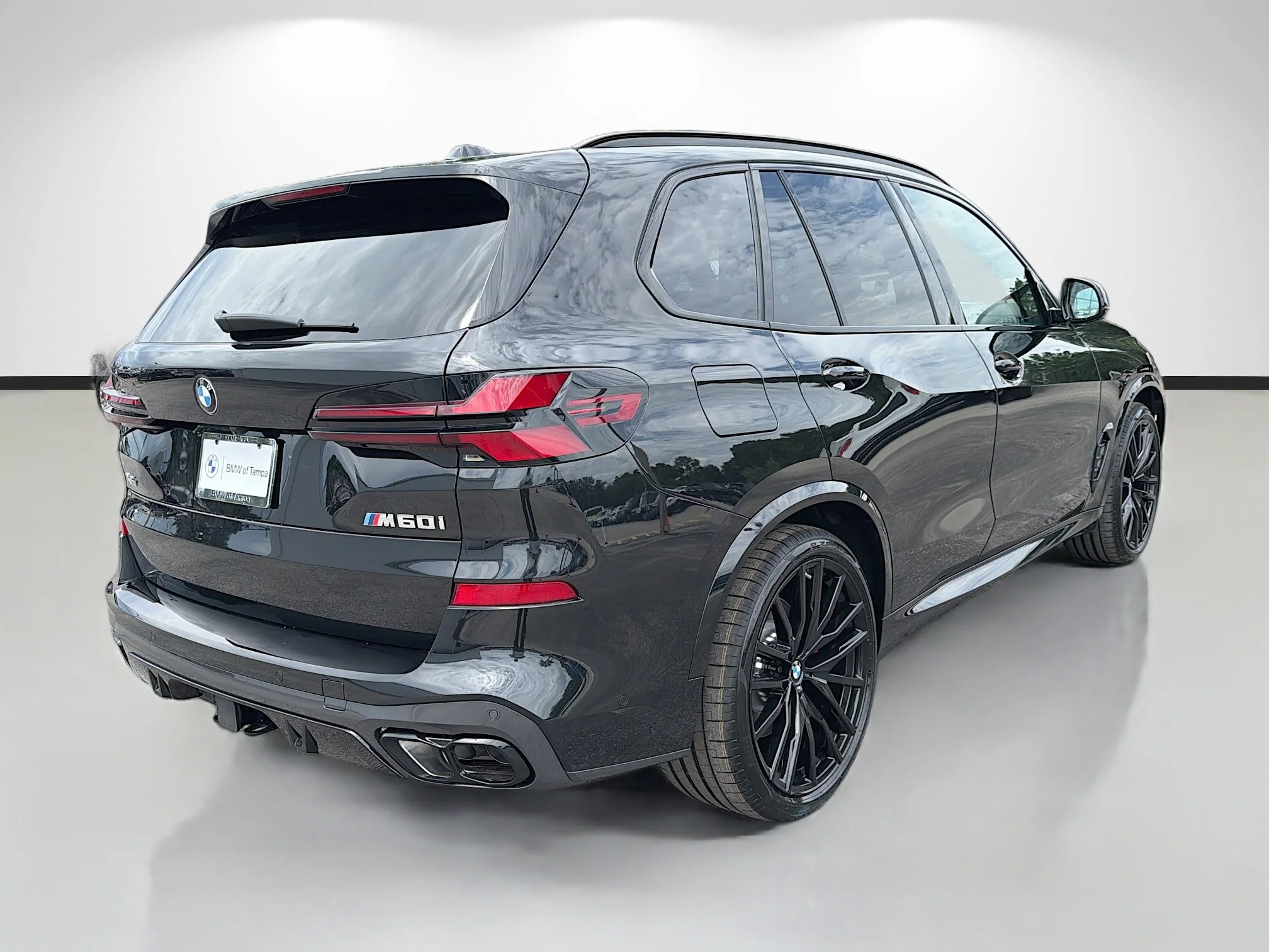 New 2026 Black Sapphire Metallic BMW M60i image 3