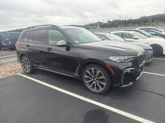 Used 2020 Black BMW M50i image 1