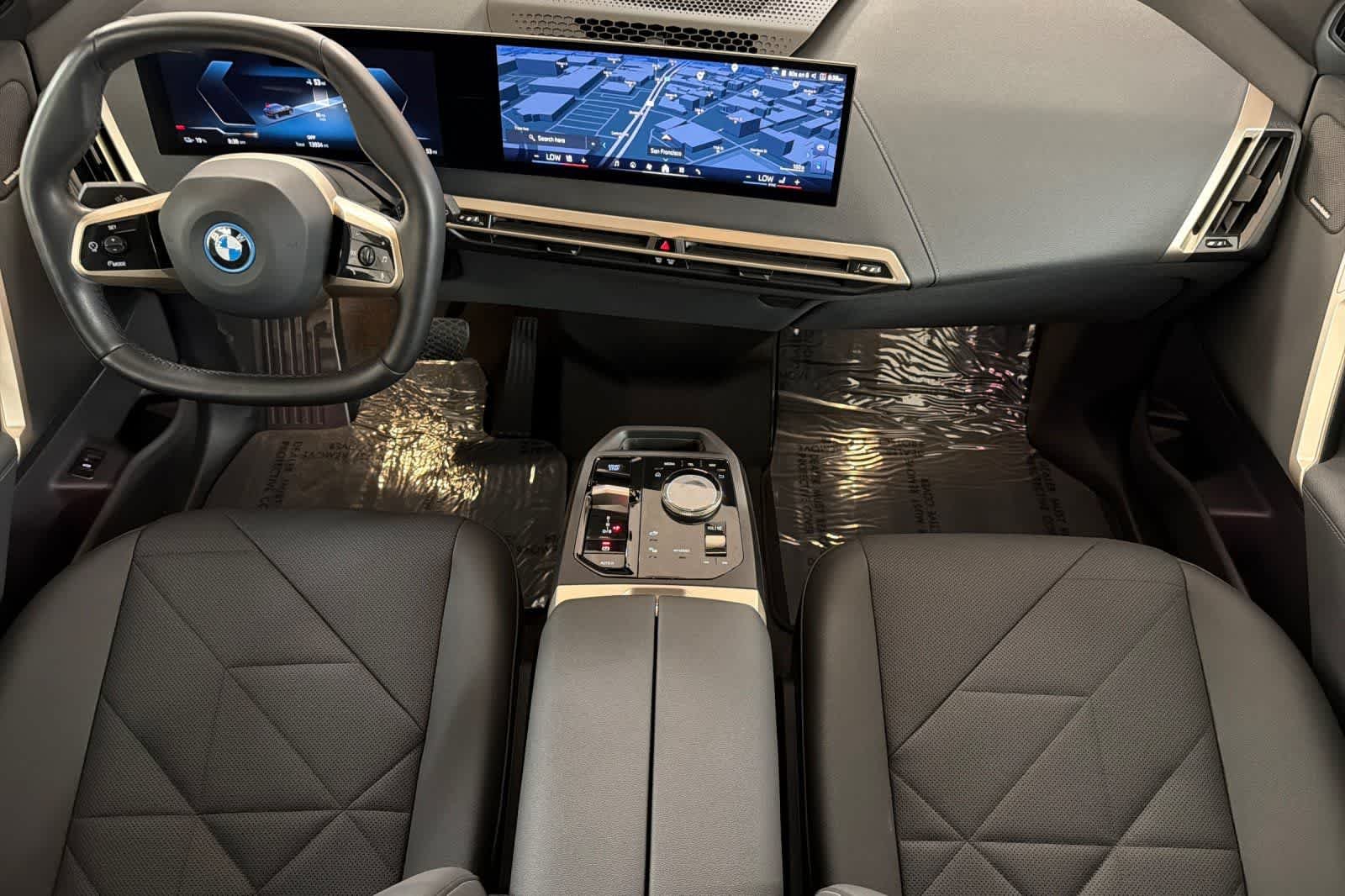 Used 2024 Black Sapphire Metallic BMW xDrive50 image 3