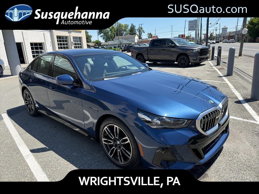 Used 2025 Phytonic Blue Metallic BMW 540i xDrive image 1