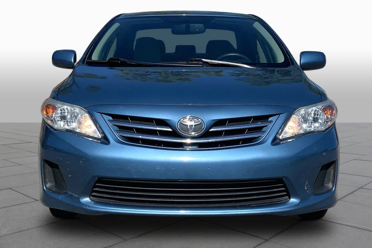Used 2013 Tropical Sea Metallic Toyota LE image 4