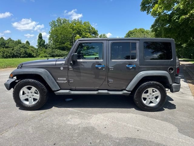 Used 2014 Gray Jeep Unlimited Sport image 4