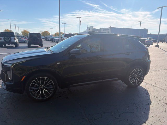 Used 2024 Stellar Black Metallic Cadillac Sport image 2