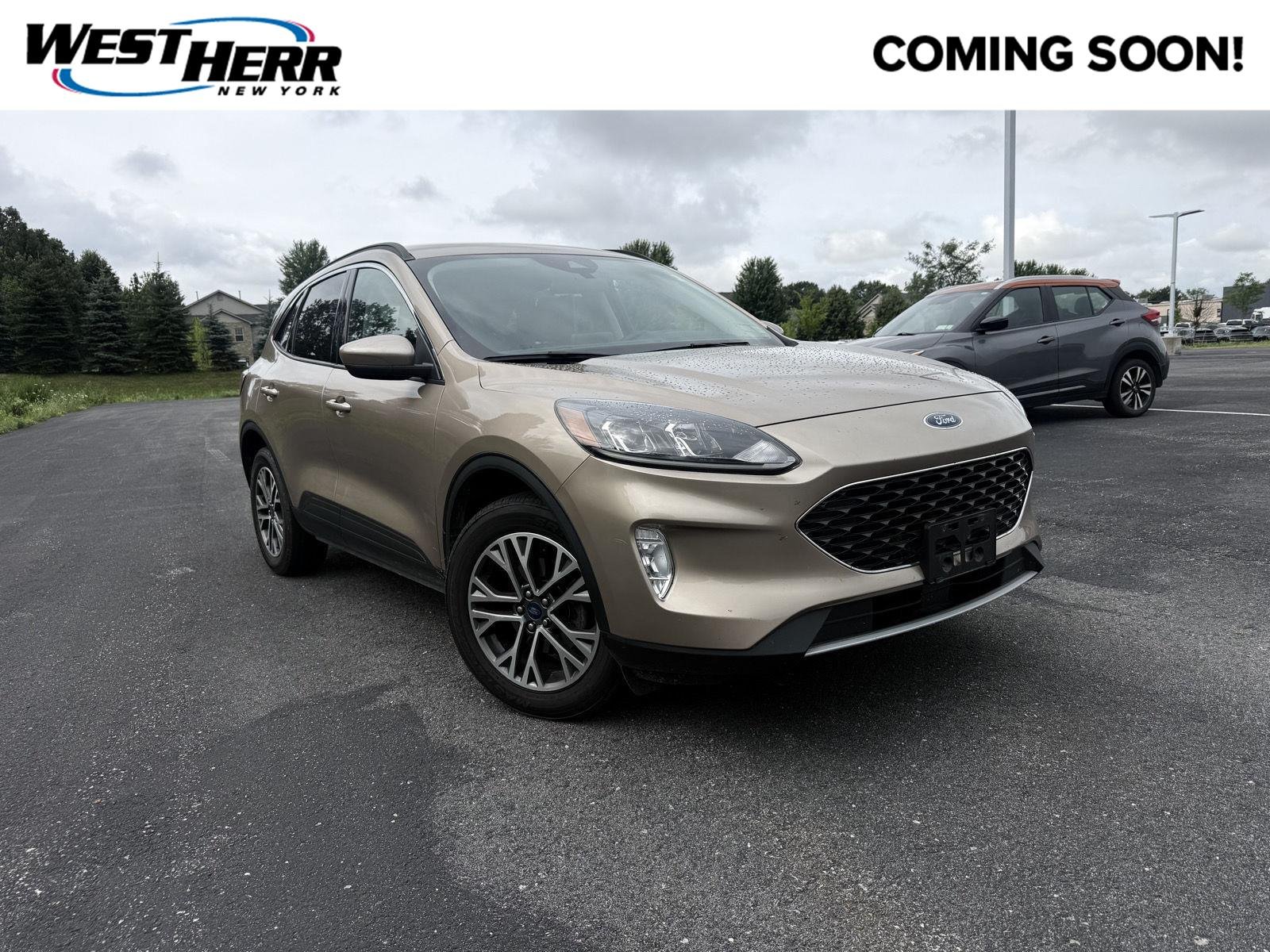 Used 2021 Desert Gold Ford SEL image 1