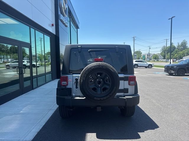Used 2016 Billet Silver Metallic Clearcoat Jeep Unlimited Sport image 4