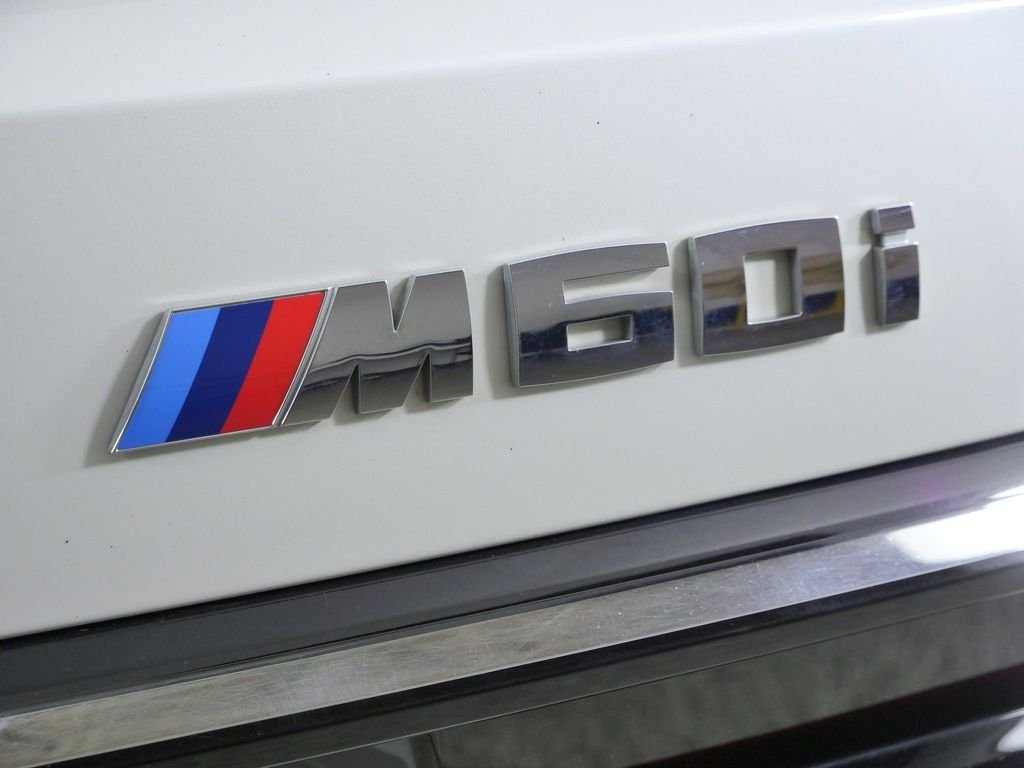 Certified Used 2024 Mineral White Metallic BMW M60i image 15