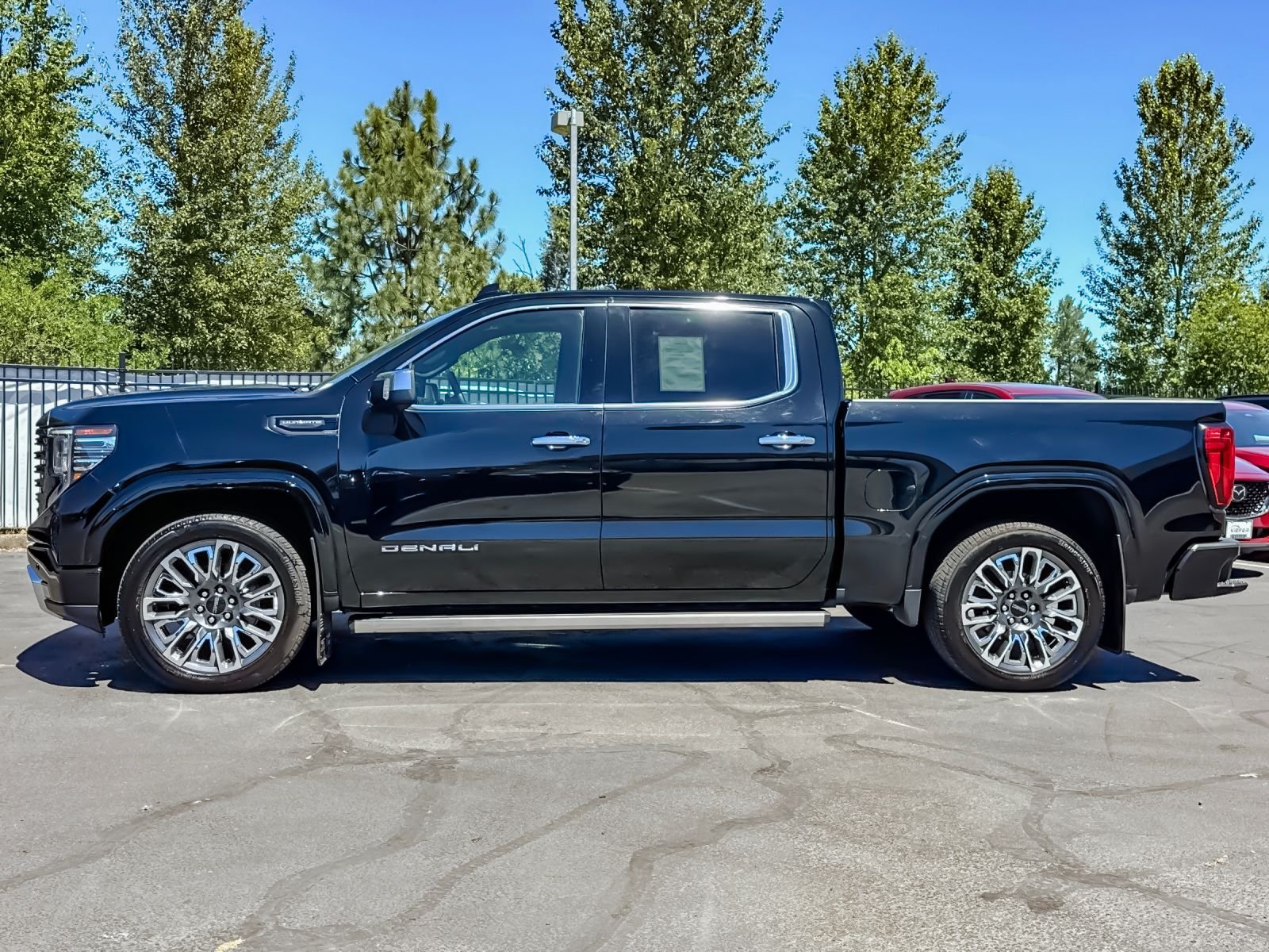 Used 2024 Black GMC Denali Ultimate image 6