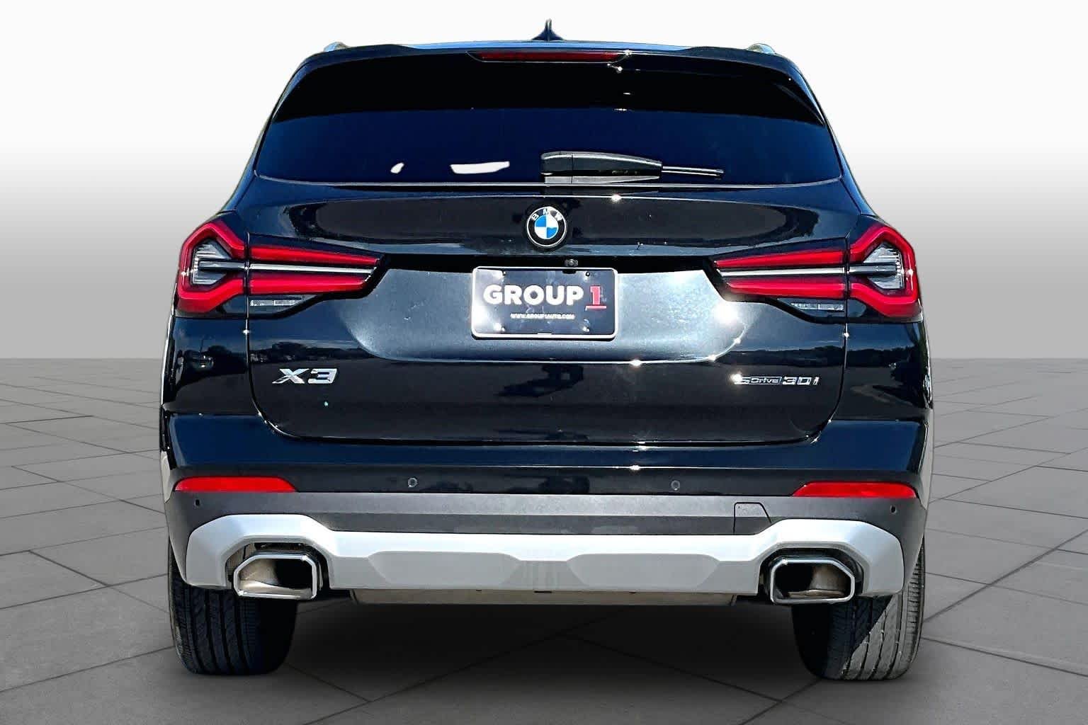 Certified Used 2023 Black Sapphire Metallic BMW sDrive30i image 4