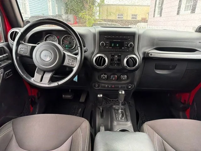 Used 2014 Red Jeep Unlimited Sahara image 27