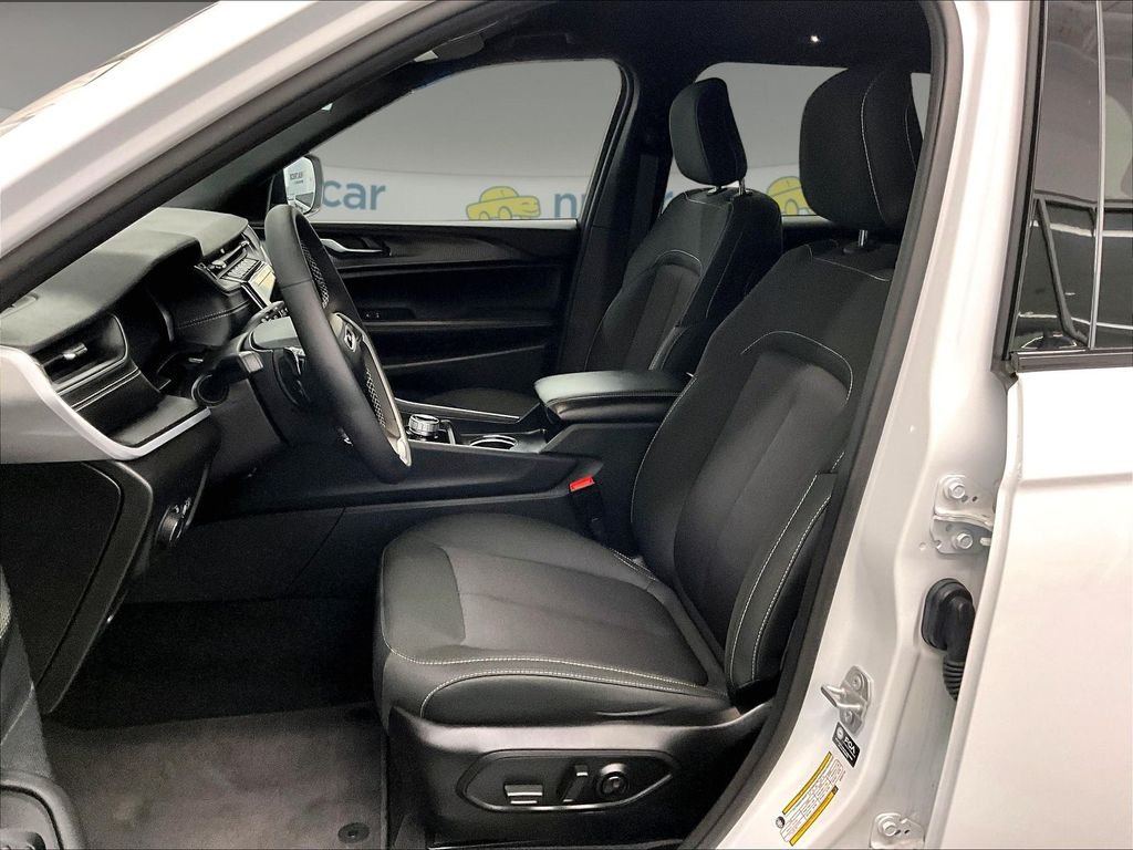 Used 2025 Bright White Clearcoat Jeep Laredo image 10