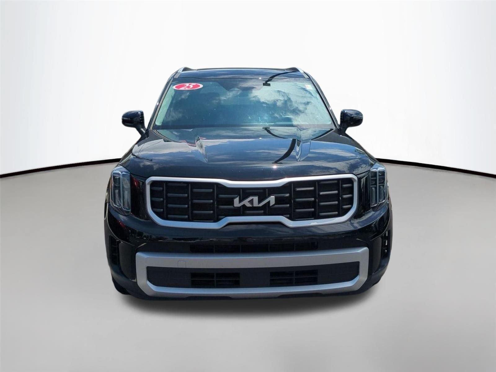 Used 2025 Ebony Black Kia S image 6