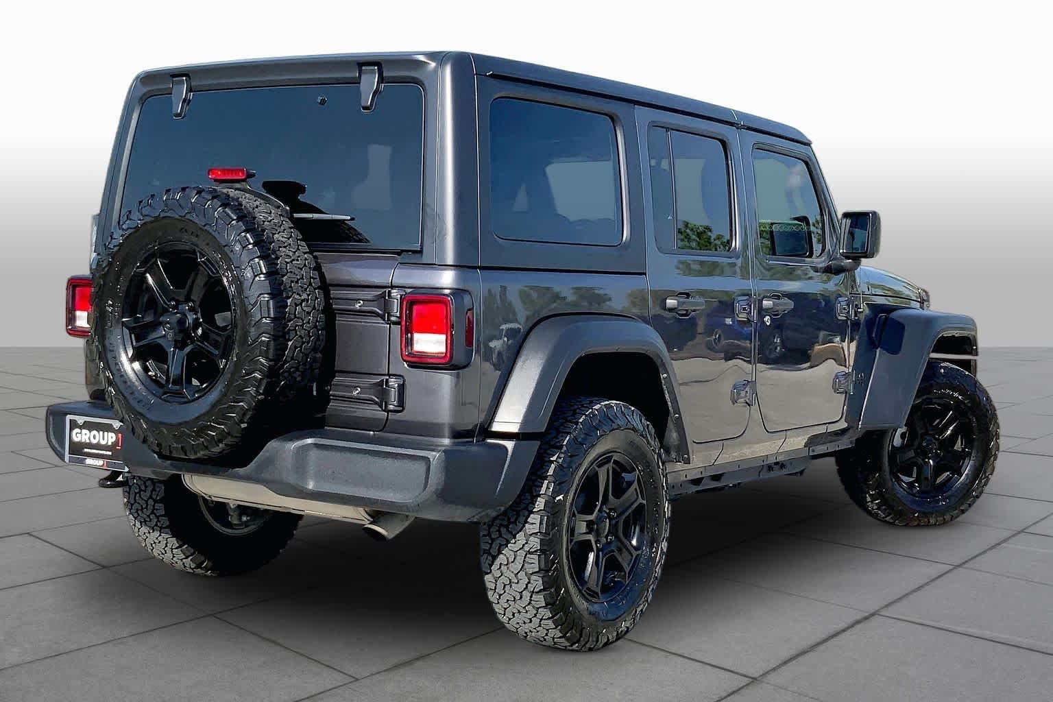 Used 2022 Granite Crystal Metallic Clearcoat Jeep Unlimited Sport S image 13