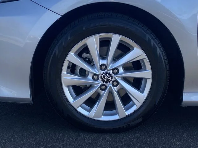 Used 2023 Celestial Silver Metallic Toyota LE image 8