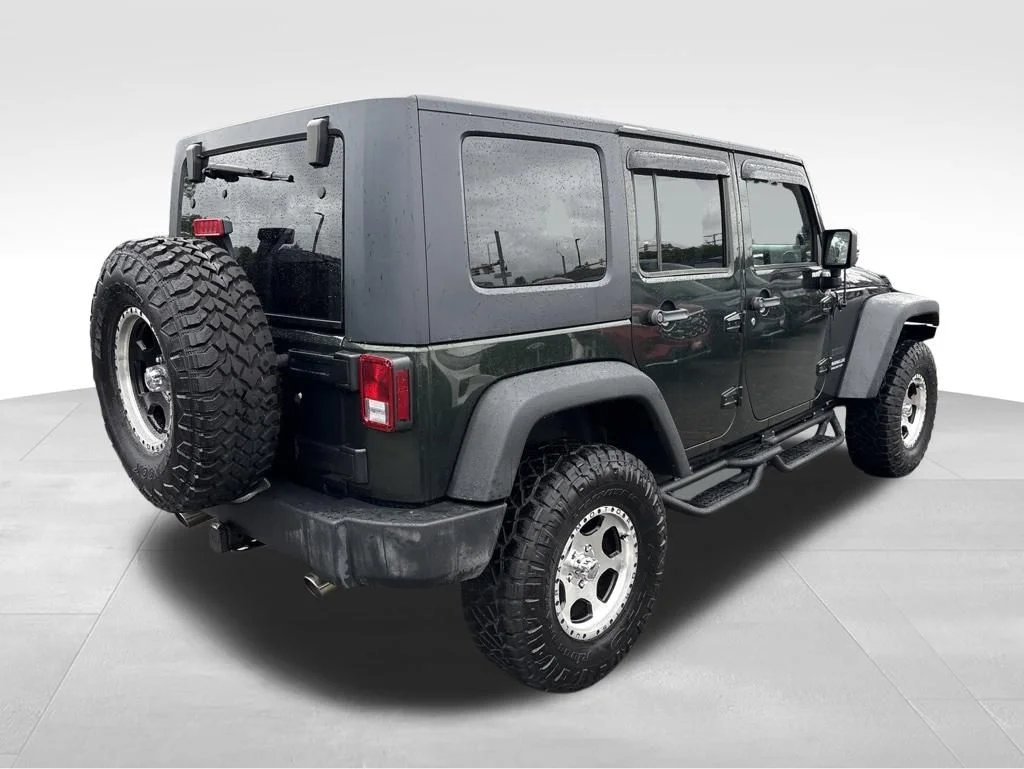 Used 2010  Jeep Unlimited Sport image 5