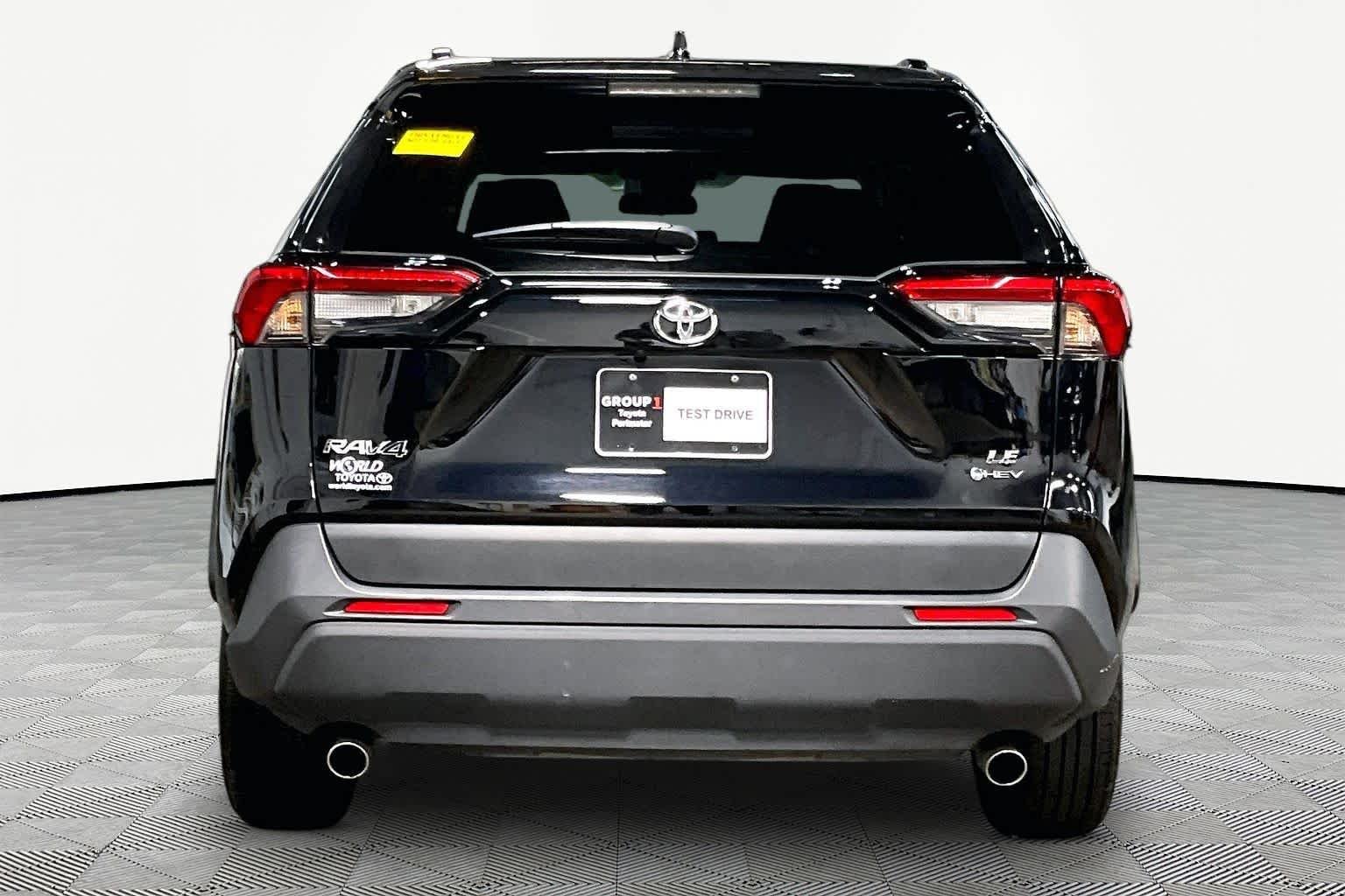 Used 2025 Midnight Black Metallic Toyota Hybrid LE image 5