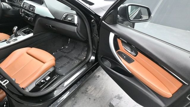 Used 2016 Black BMW 328i xDrive image 13
