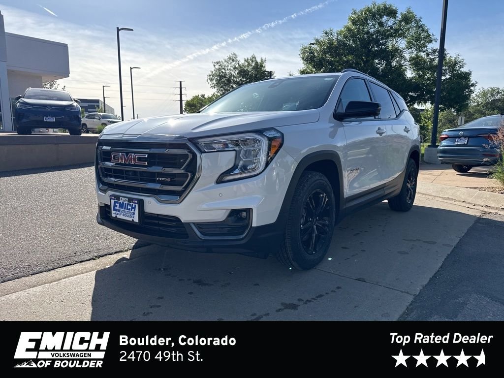 Used 2024 White Frost GMC AT4 image 1