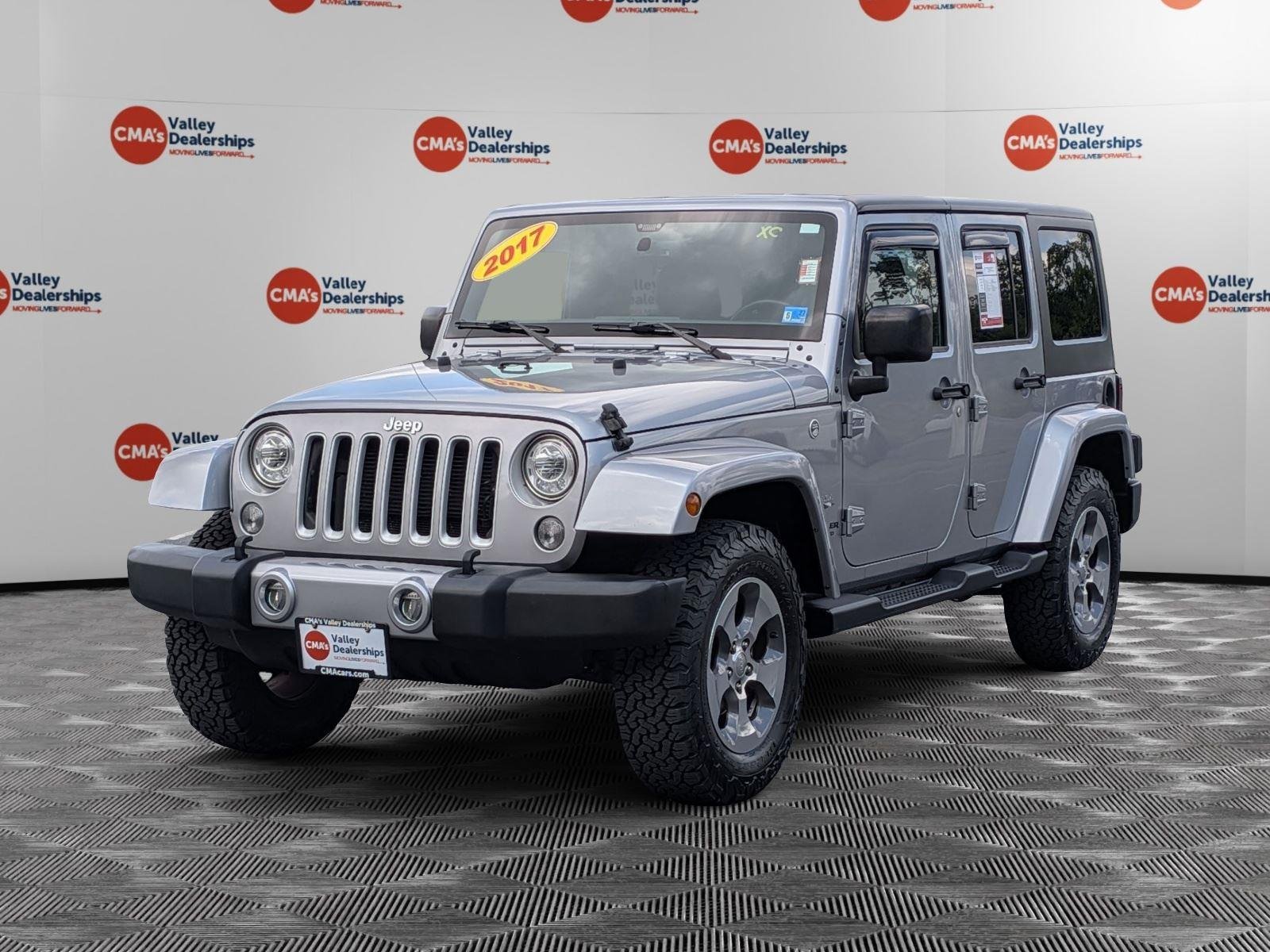 Used 2017 Billet Silver Metallic Clearcoat Jeep Sahara image 1