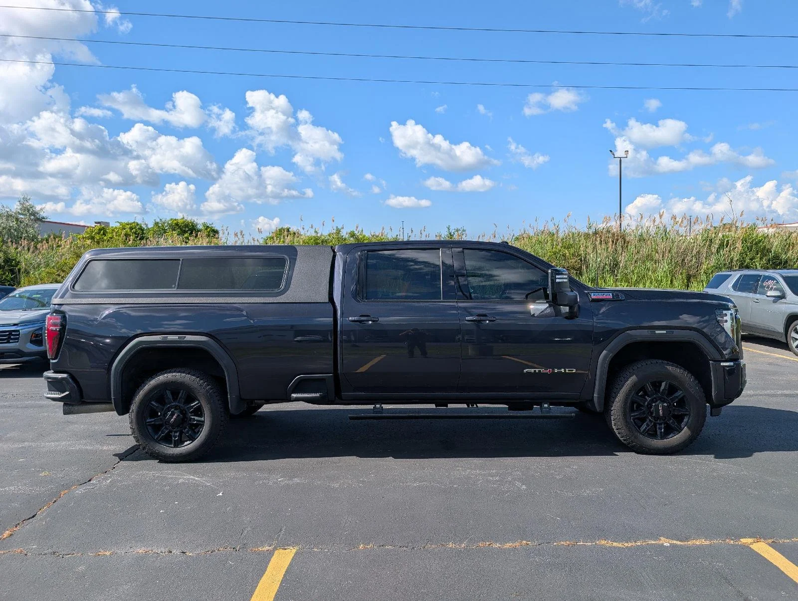 Used 2024 Titanium Rush Metallic GMC AT4 image 9