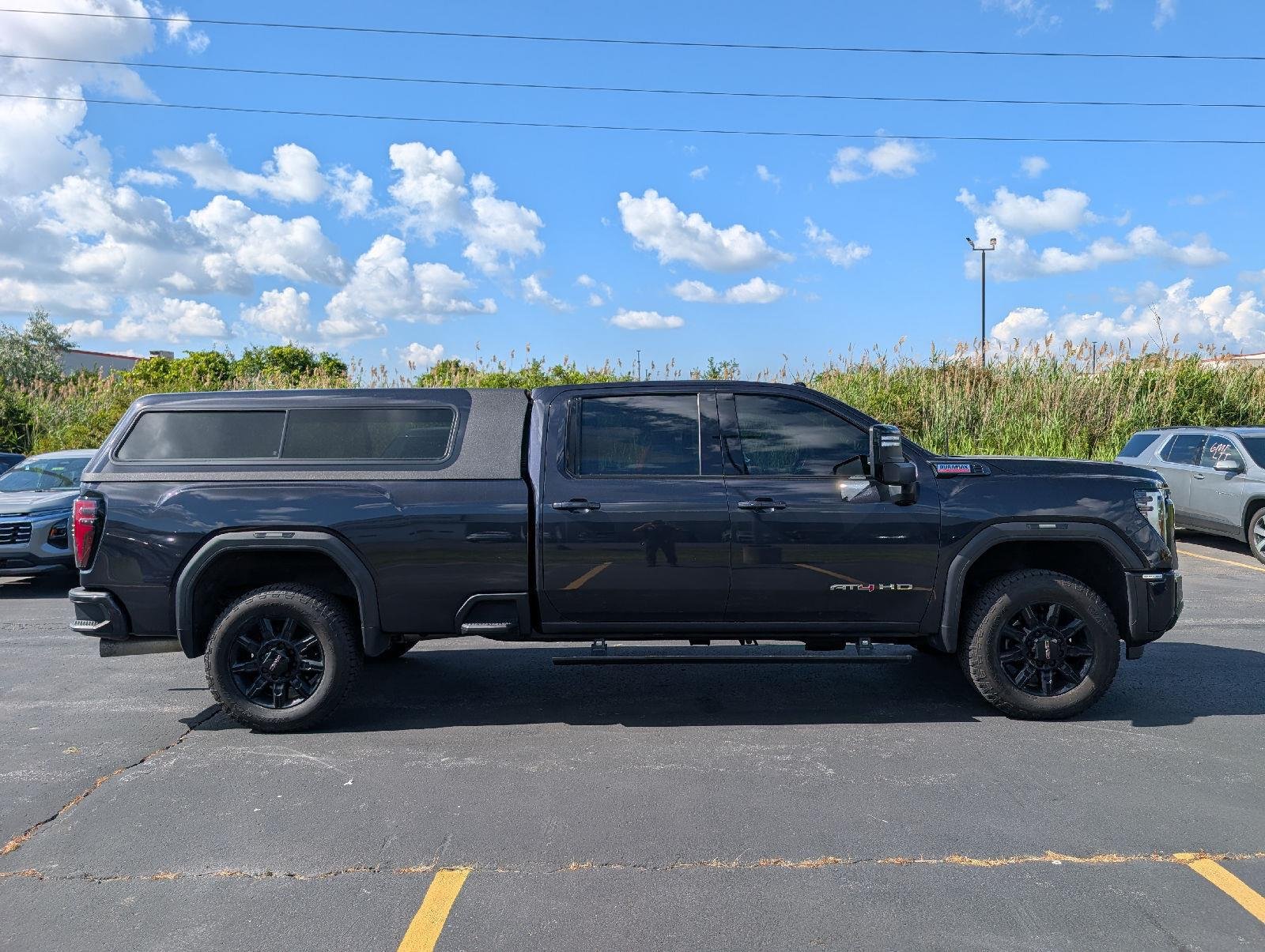 Used 2024 Titanium Rush Metallic GMC AT4 image 9