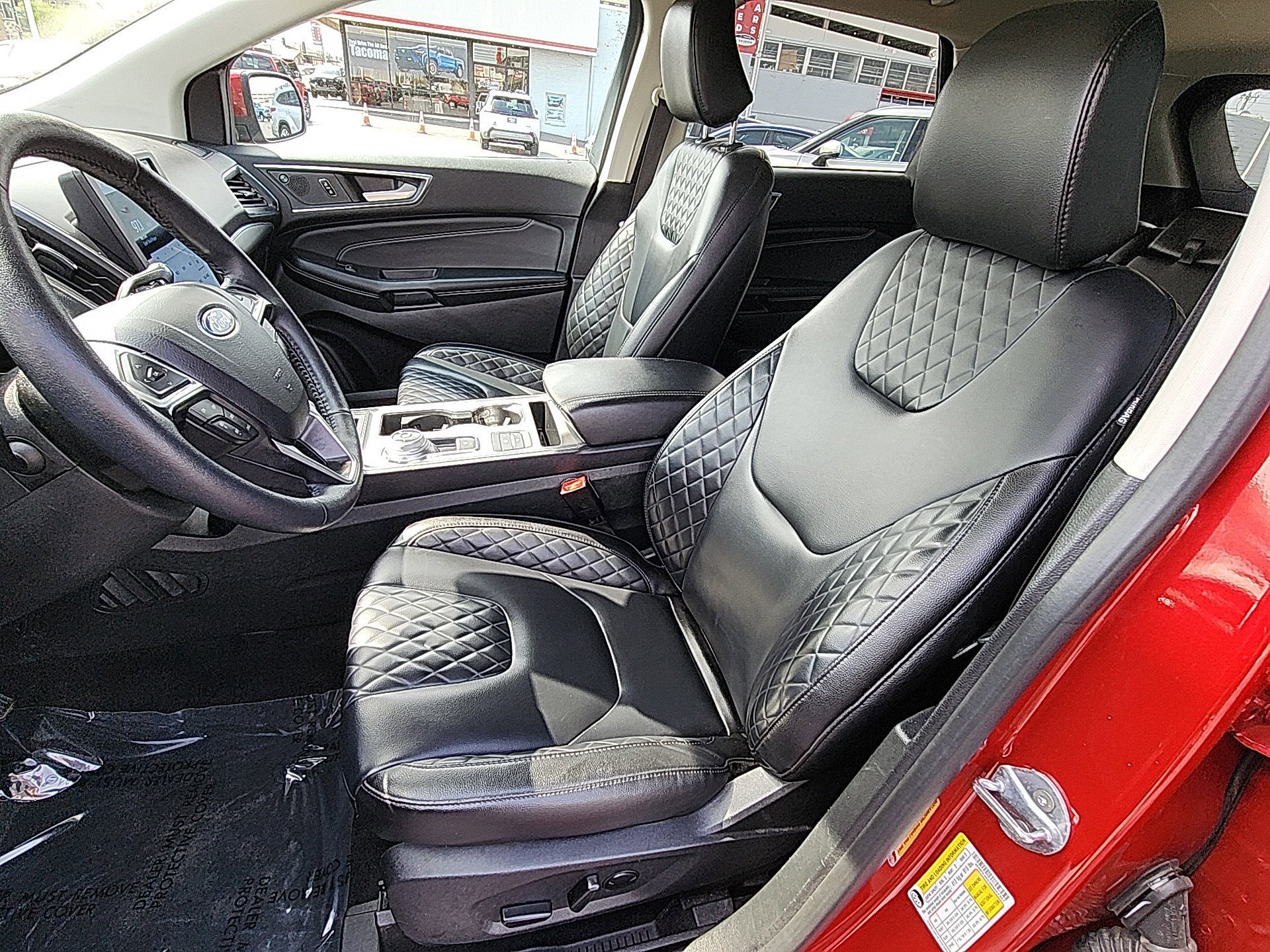 Used 2024 Rapid Red Metallic Tinted Clearcoat Ford Titanium image 19