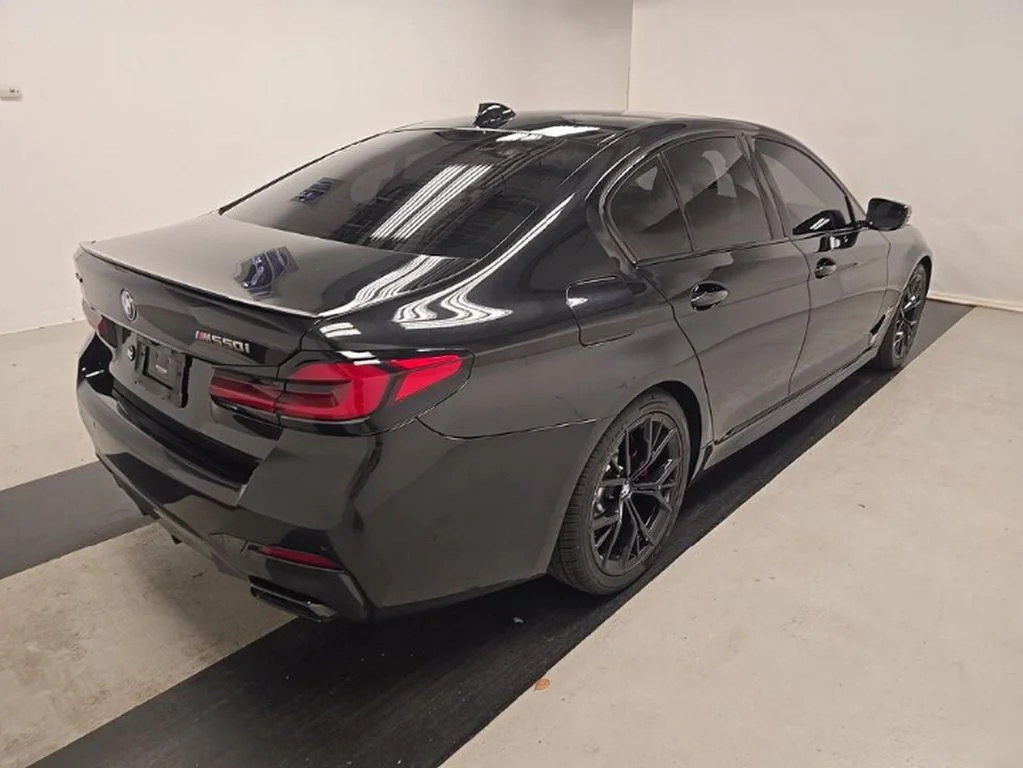 Used 2021 Black BMW M550i xDrive image 4
