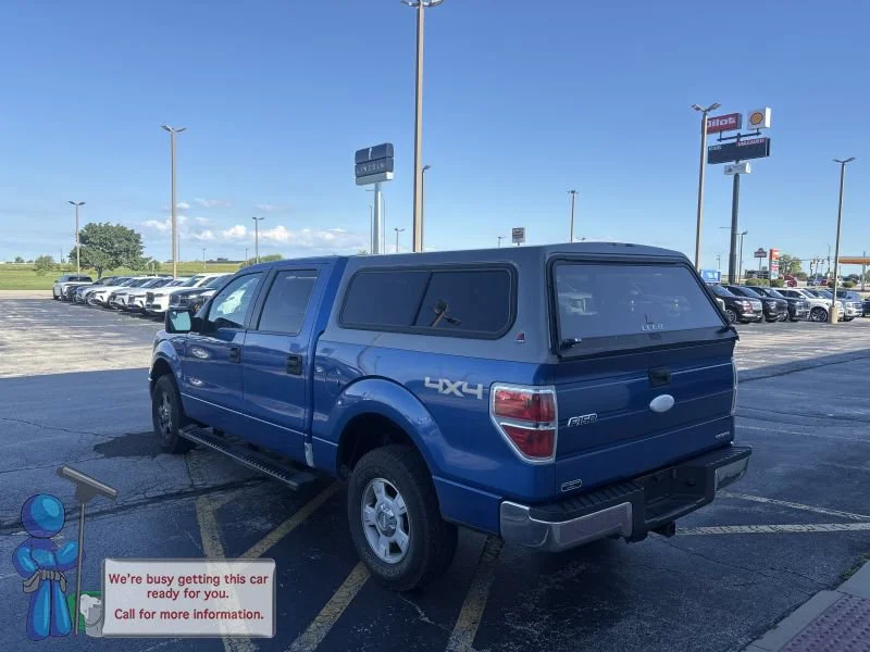 Used 2011 Blue Flame Metallic Ford XLT image 3