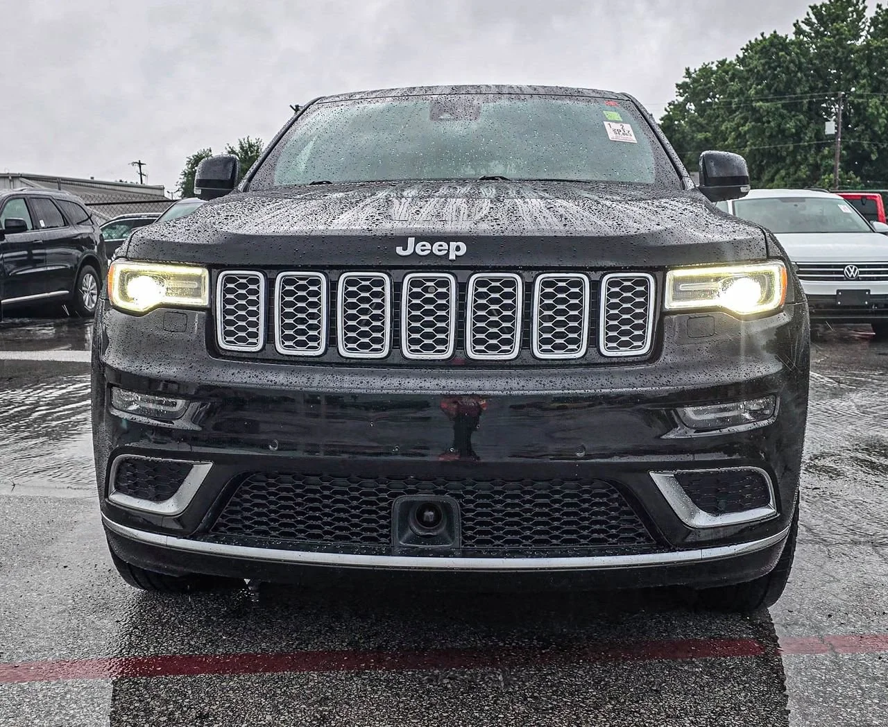 Used 2017 Black Jeep Summit 4x4 image 1