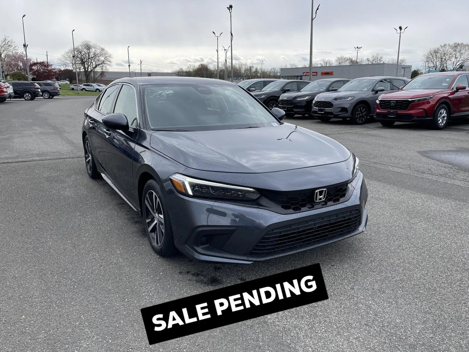 Used 2022 Meteorite Gray Metallic Honda LX image 1