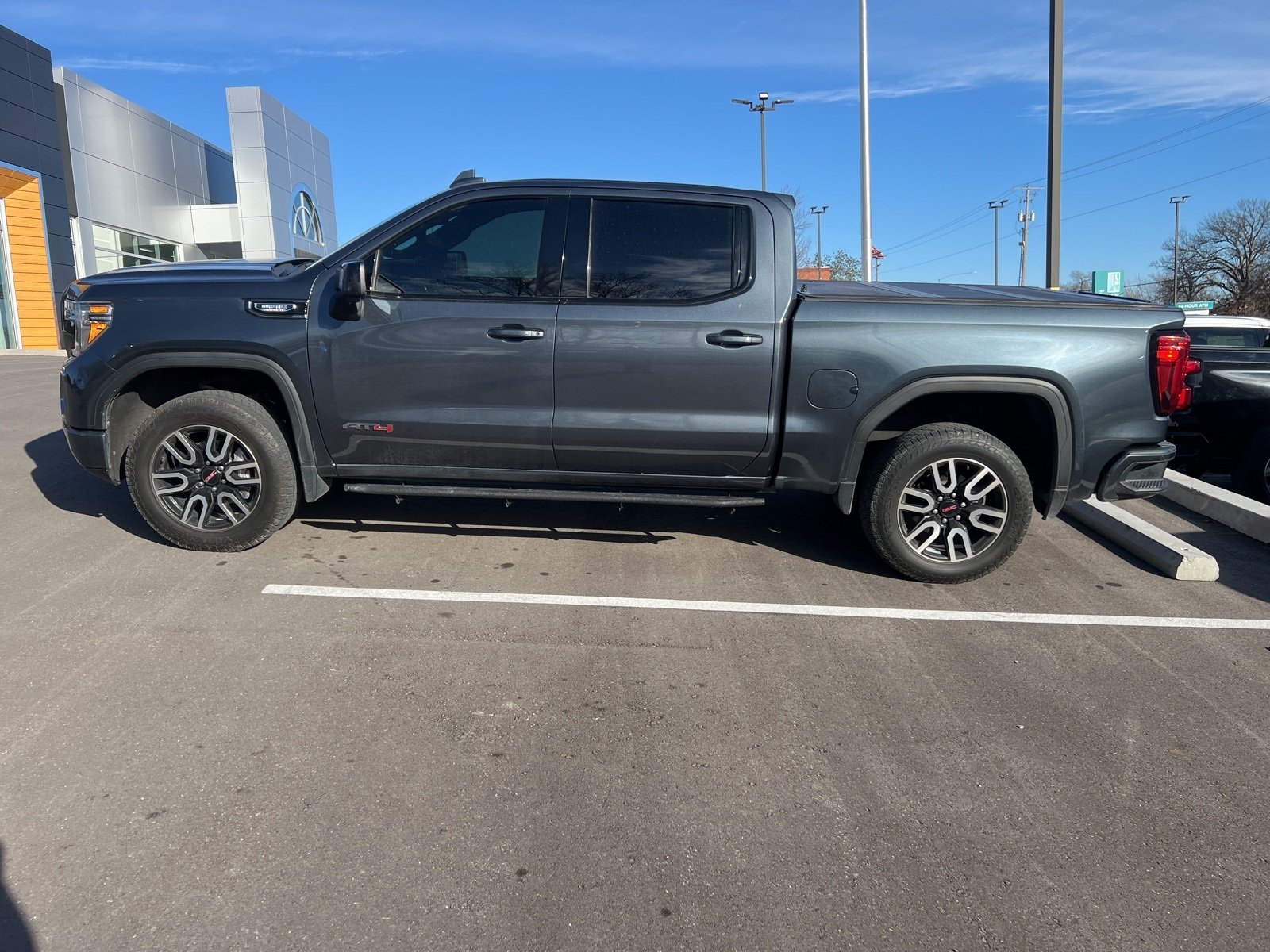 Used 2021 GMC Sierra 1500 AT4 with VIN 1GTU9EET7MZ393021 for sale in Kansas City