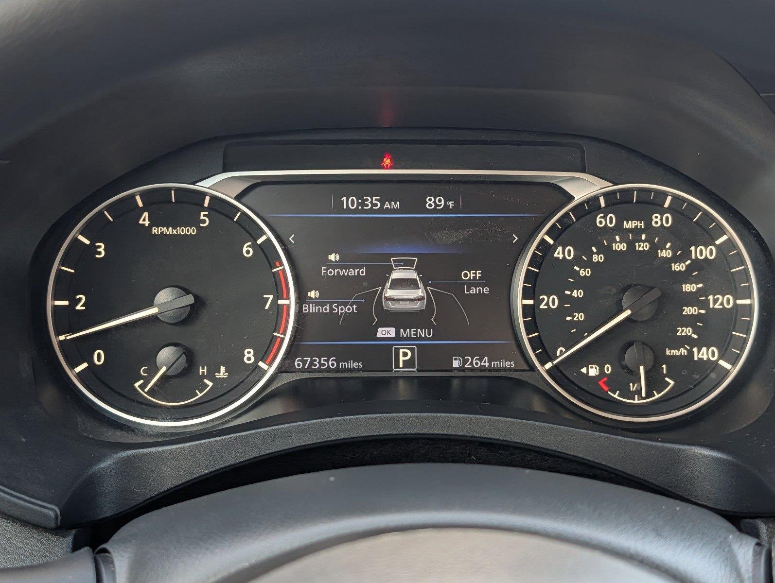 Used 2025 Garnet Pearl Metallic Nissan SV image 20