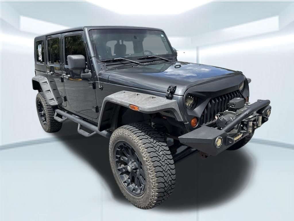 Used 2010 Gray Jeep Unlimited Sport image 6