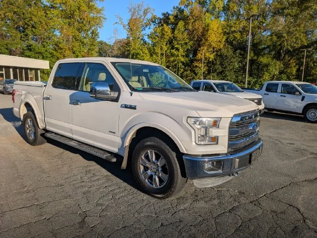 Used 2015 White Ford Lariat image 1