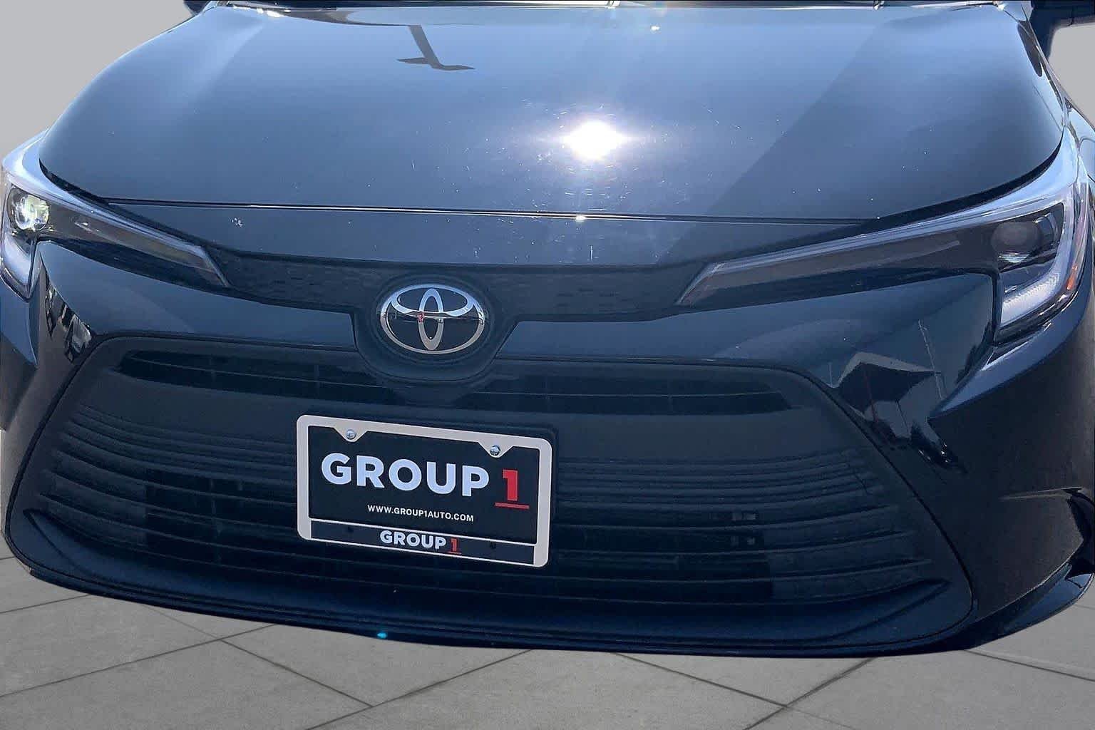 Used 2026 Midnight Black Metallic Toyota Hybrid LE image 30