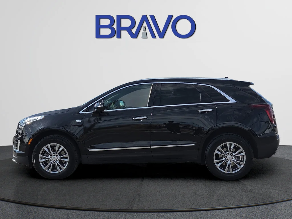 Used 2023 STELLAR BLACK METALLIC Cadillac FWD Premium Luxury image 2