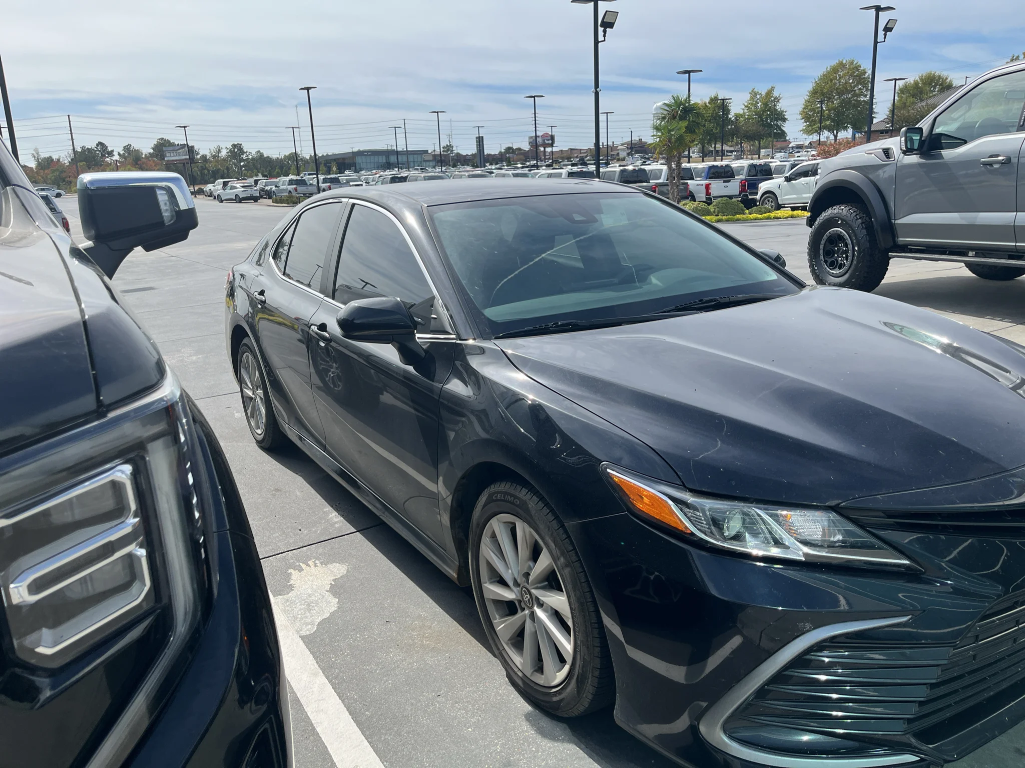 Used 2021 Midnight Black Metallic Toyota LE image 4