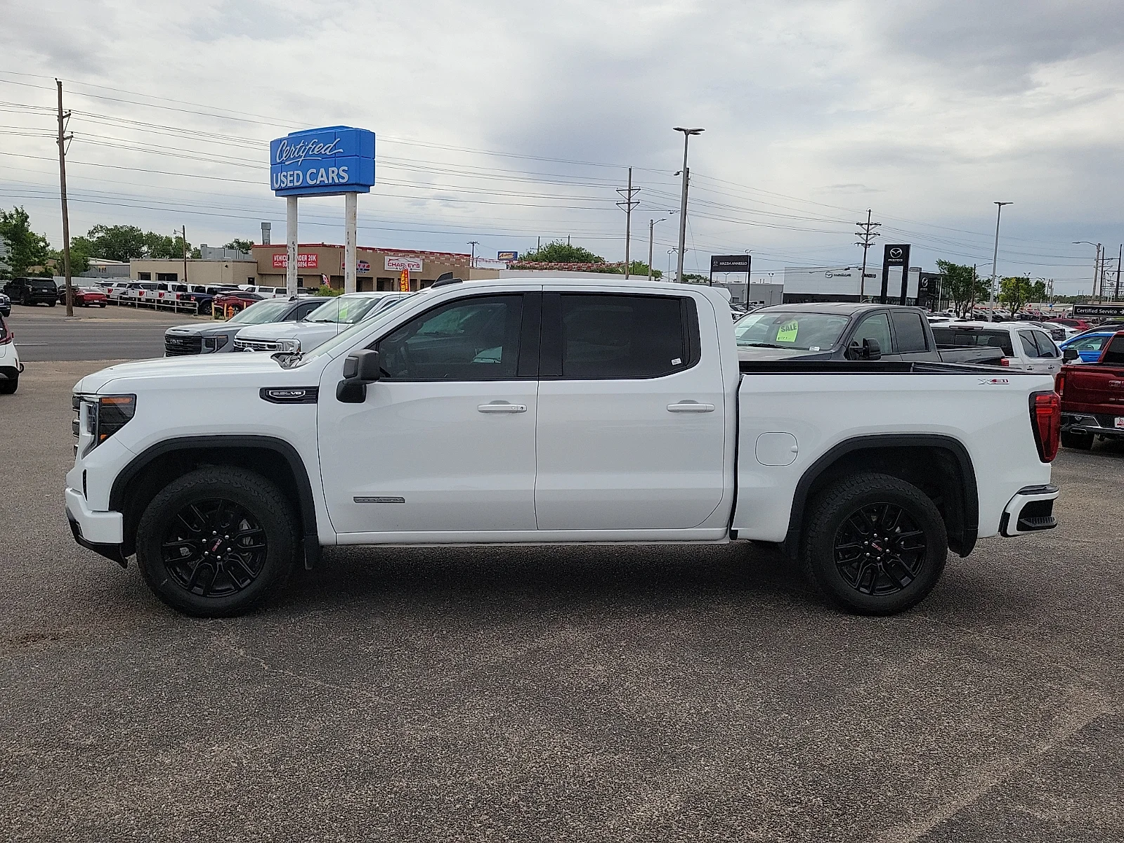 Certified Used 2024 Summit White GMC 4WD Crew Cab Short Box Elevation with 3SB image 6