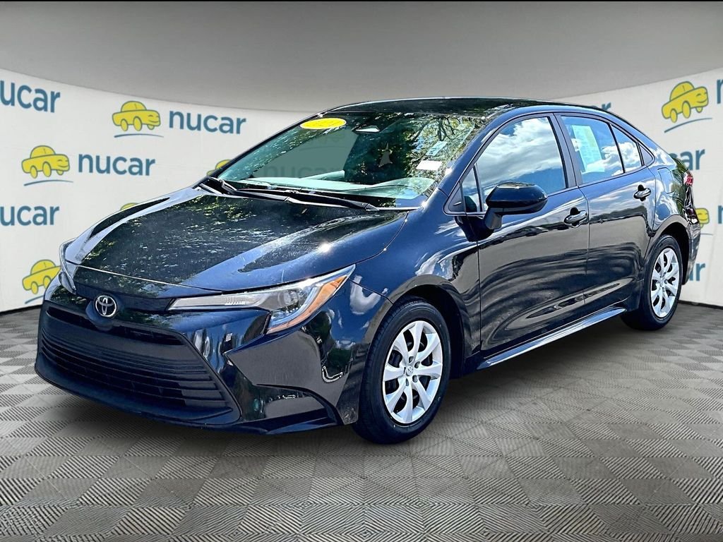 Used 2024 Black Toyota LE image 3