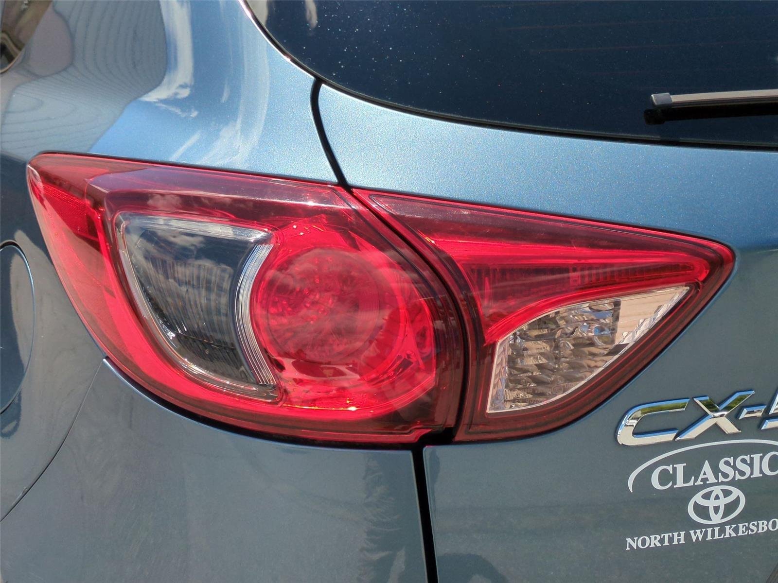 Used 2015 Blue Reflex Mica Mazda Touring image 12