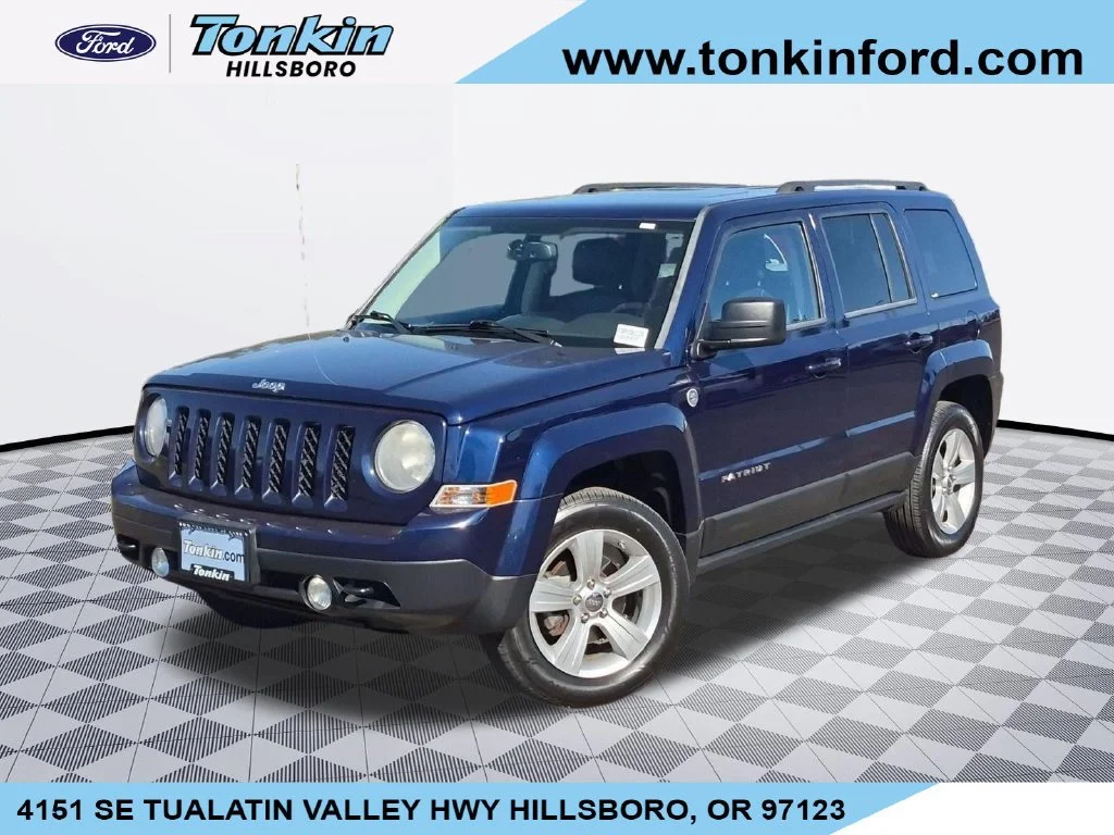 Used 2012 True Blue Pearlcoat Jeep Latitude image 1