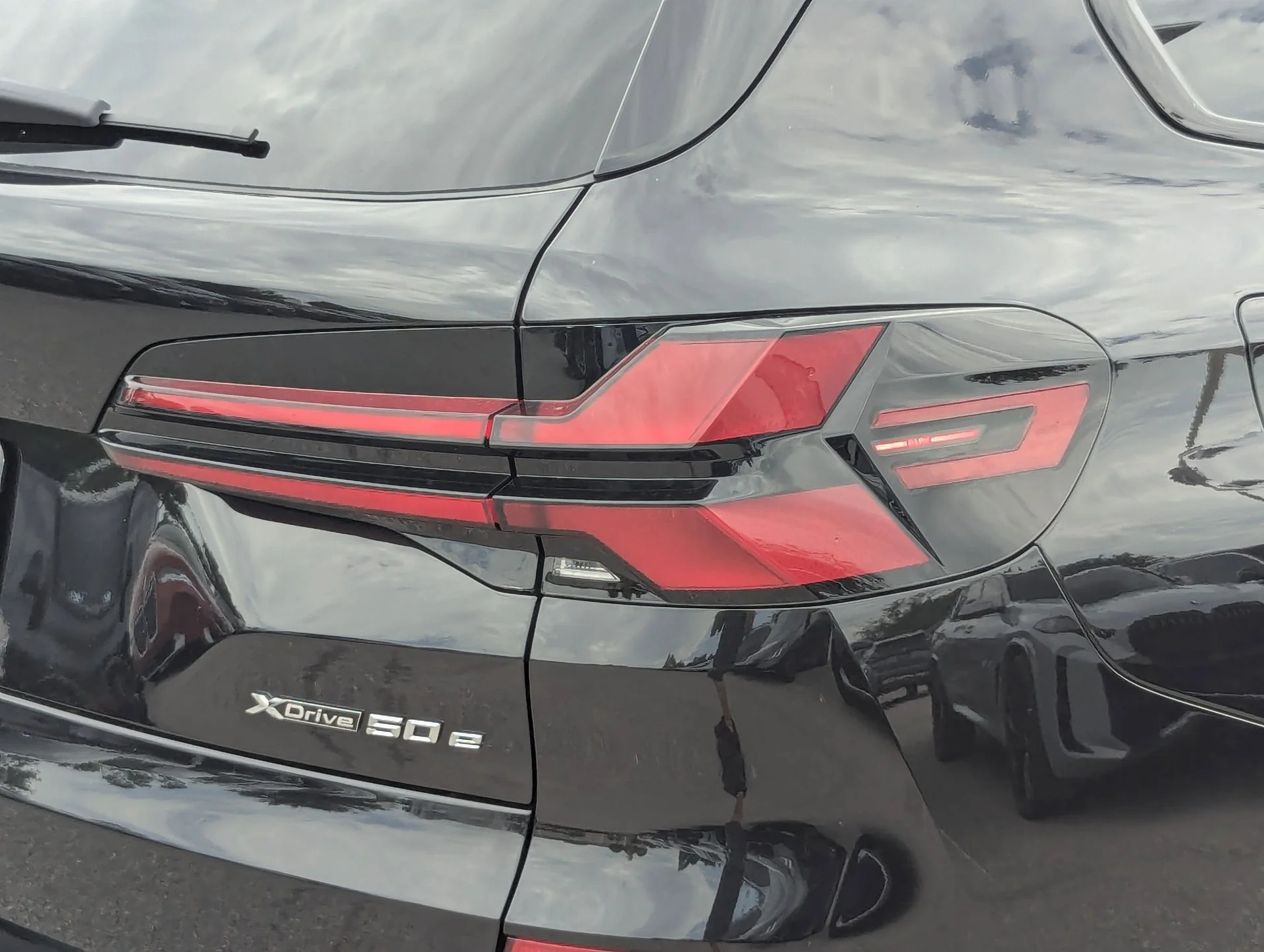 New 2026 Black Sapphire Metallic BMW xDrive50e image 10