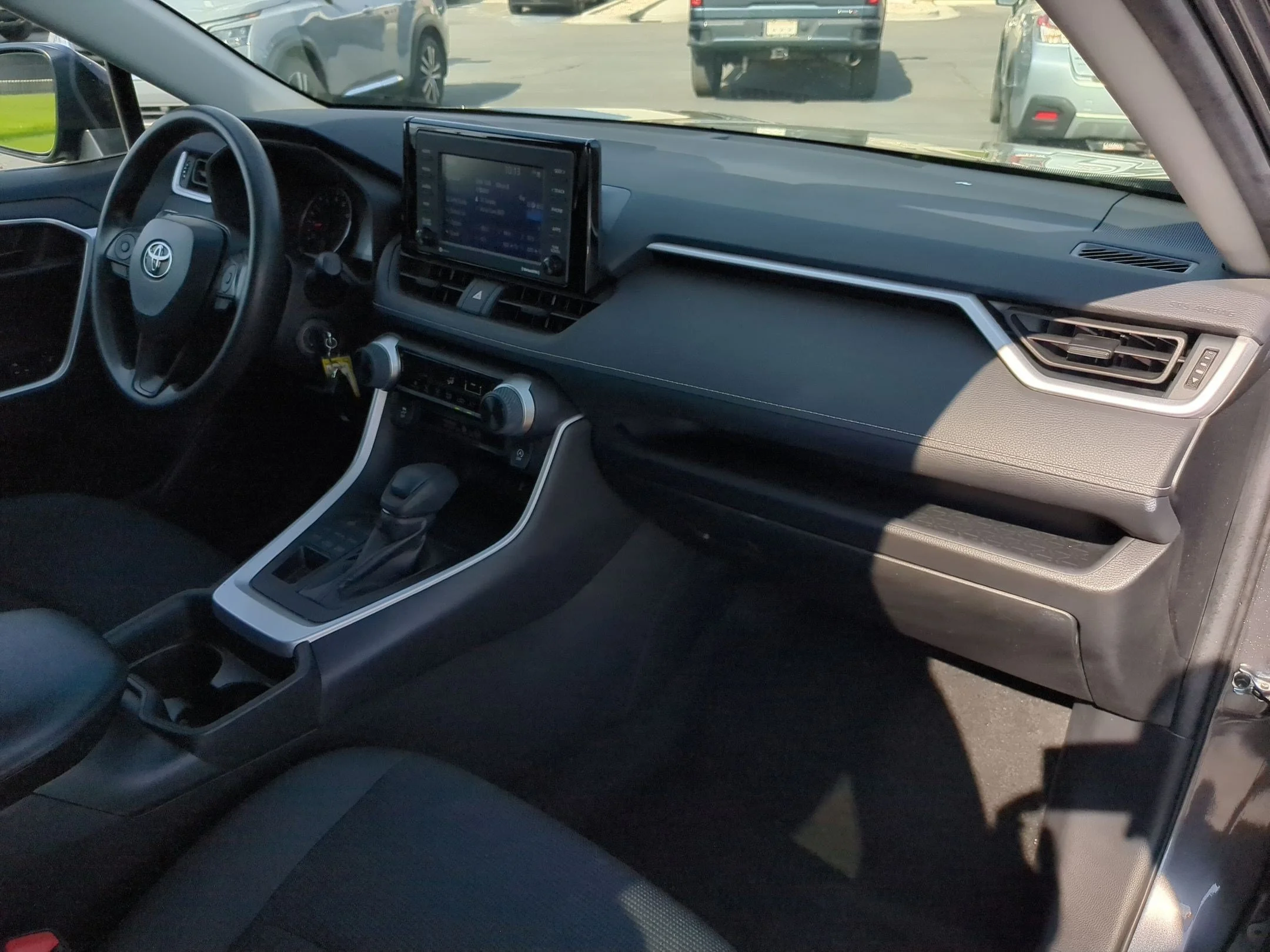 Used 2021 Midnight Black Metallic Toyota LE image 28
