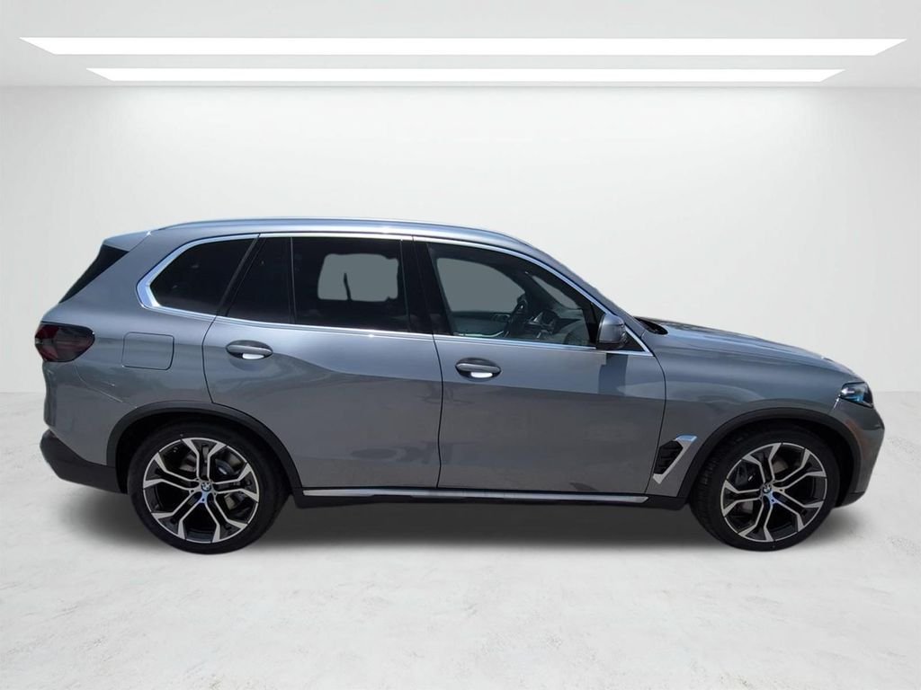 New 2026 Gray Metallic BMW xDrive50e image 3
