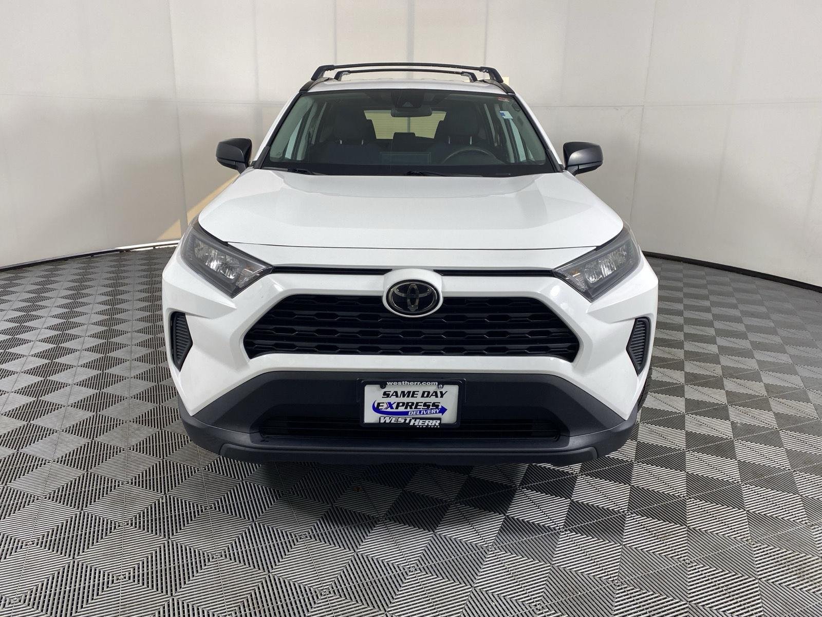 Used 2021 Super White Toyota LE image 2